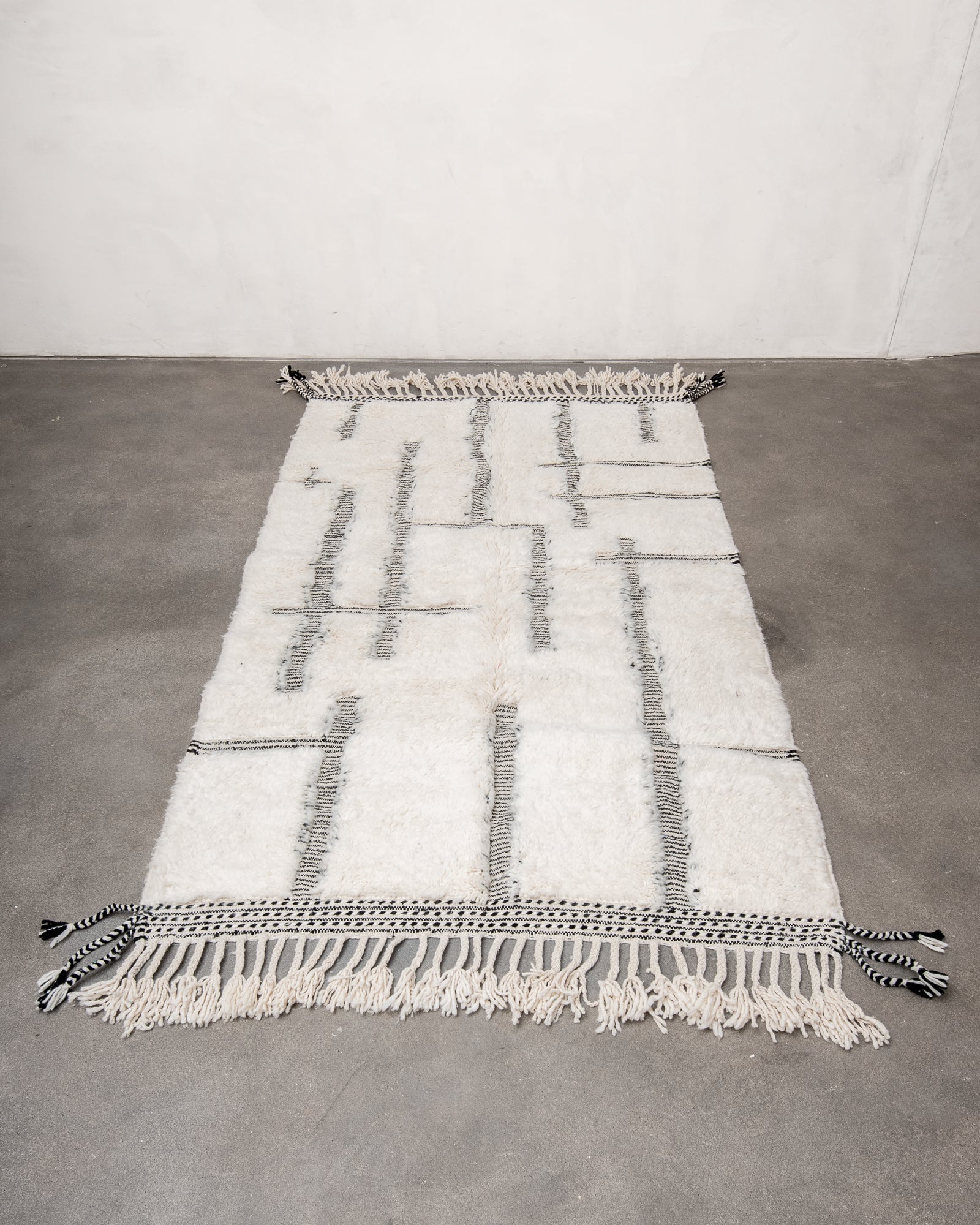 Modern, designer, handcrafted Berber rug from Morocco. Beniourain carpet with beautiful colours and patterns and fluffy wool texture.
